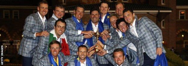 The European Ryder Cup team celebrate with the trophy after the Singles Matches for The 39th Ryder Cup at Medinah Country Club on September 30, 2012 in Medinah, Illinois.