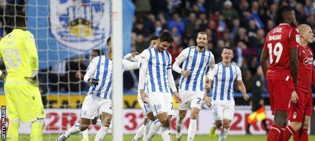 Huddersfield Town players celebrate Christopher Schindler's first-half goal