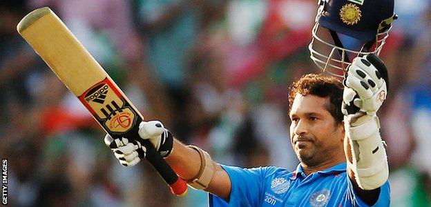 Sachin Tendulkar celebrates bringing up a century