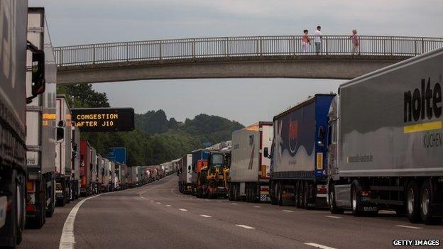 Trucks queue on the M20