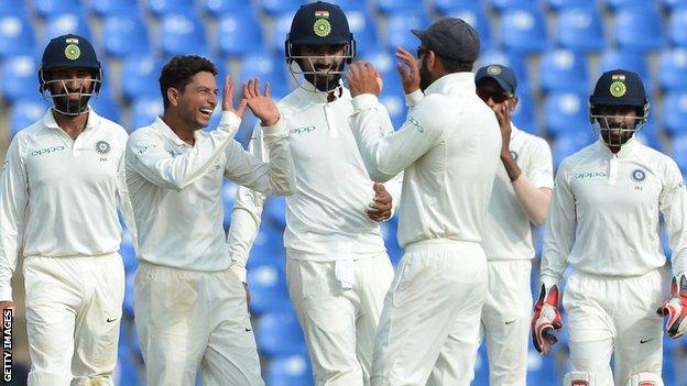 India players celebrate a wicket