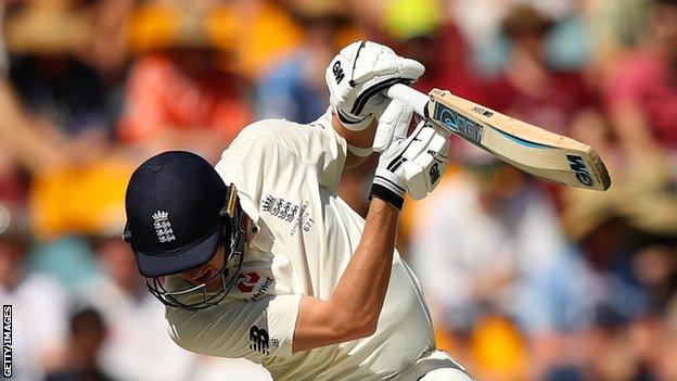 England's Jake Ball is caught trying to avoid a bouncer