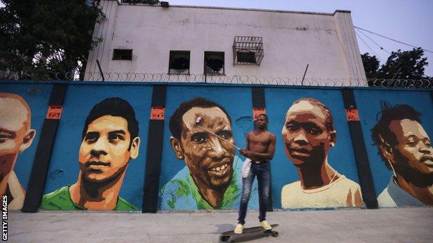 a new mural of street art honoring the first Olympic refugee team during the Rio 2016 Olympic Games on August 17, 2016 in Rio de Janeiro, Brazil. The graffitti, created by the artists Rodrigo Sini and Cety Soledade, honors the stateless refugees, six men and four women, who hail from South Sudan, Syria, the Deomocratic Republic of Congo and Ethiopia.