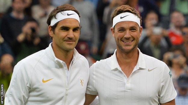 Roger Federer (left) and Marcus Willis