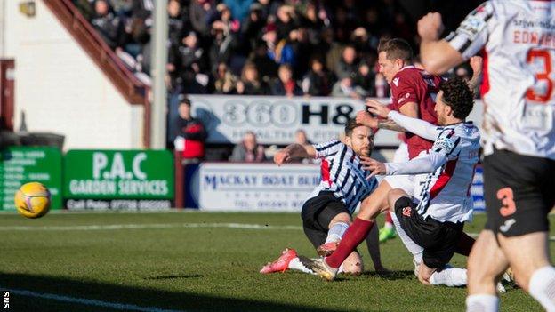 Arbroath's David Gold scores