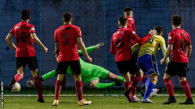 Sam Bowen scores for Barry against Cefn Druids