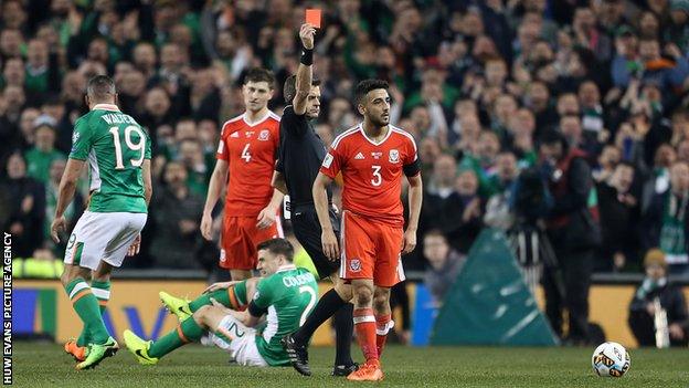 Wales left-back Neil Taylor was sent off for his tackle that broke Seamus Coleman's leg in Dublin