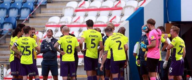 Exeter players take a water break