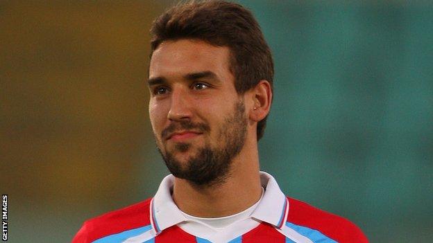 Blazej Augustyn playing for Catania in 2011