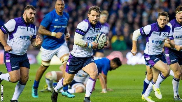 Peter Horne races through to score one of Scotland' six tries at Murrayfield