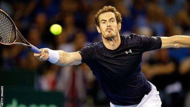 Andy Murray stretches for a forehand