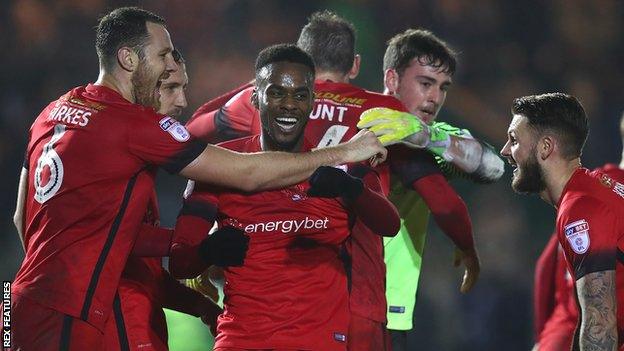 Leyton Orient players celebrate their win over Plymouth Argyle