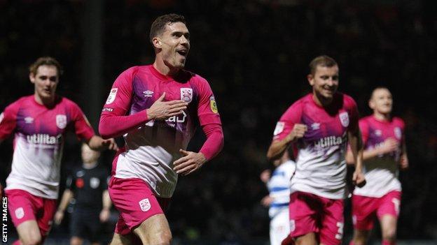 Josh Ruffels celebrates one of his goals for Huddersfield Town at QPR