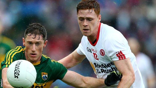 Jonathan Lyne of Kerry competes against Tyrone's Conor Meyler at Croke Park