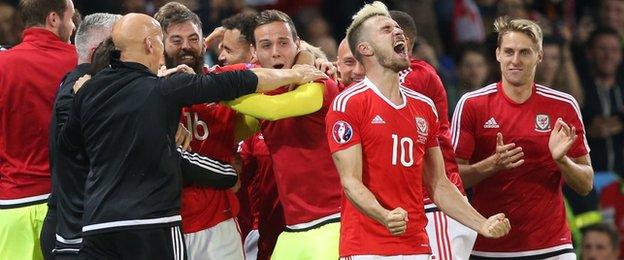 Aaron Ramsey and Wales team-mates celebrate after win over Belgium