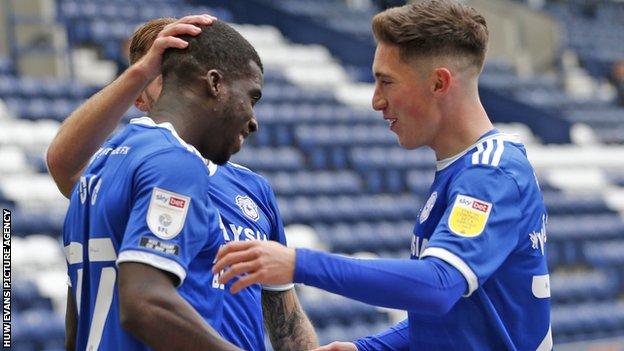 Harry Wilson celebrates with Sheyi Ojo, who is also on loan at Cardiff from Liverpool