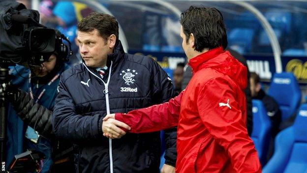 Rangers manager Graeme Murty shakes the hand of Falkirk counterpart Paul Hartley