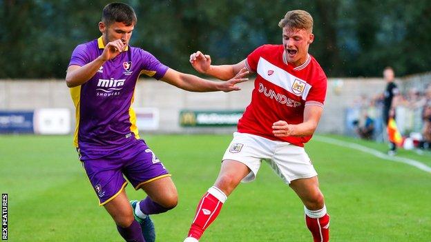 Newport County fans have donated money to pay the wages of Cameron Pring (R) while he is on loan