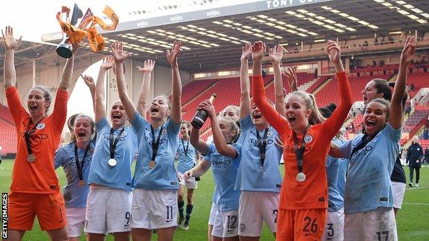 Manchester City celebrate victory over Arsenal