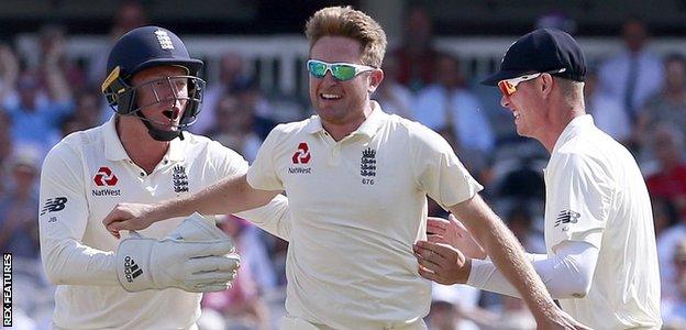 Liam Dawson celebrates a wicket with Jonny Bairstow and Keaton Jennings