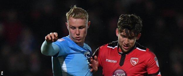 Callum Lang (right) made three senior appearances for Wigan prior to joining Morecambe on loan in August