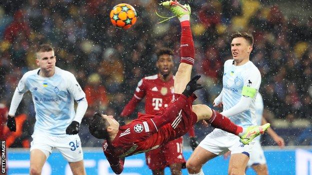 Robert Lewandowski of Bayern Munich scores against Dynamo Kyiv in the Champions League