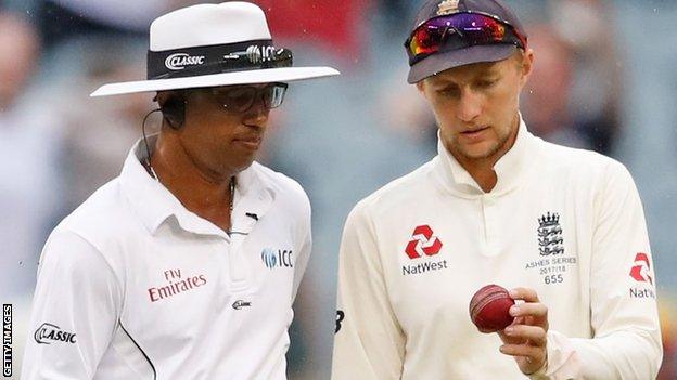 Umpire Kumar Dharmasena and England captain Joe Root