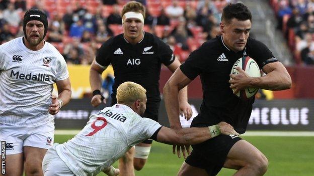 New Zealand's Will Jordan evades a tackle