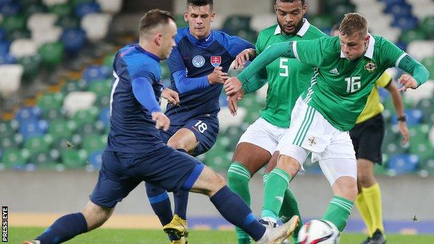 Daniel Ballard in a tussle for the ball with Northern Ireland U21s