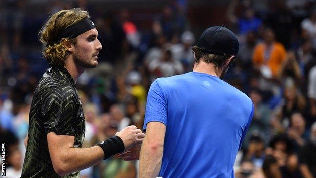 Stefanos Tsitsipas and Andy Murray shake hands after the US Open match