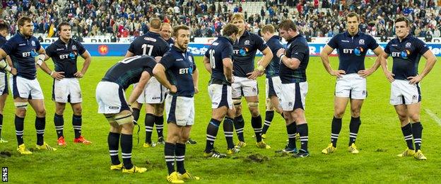 The Scotland players mull over their 19-16 defeat by France in Paris