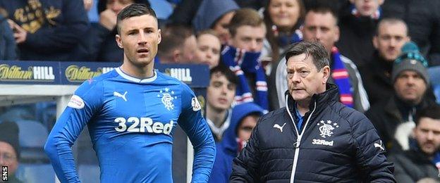 Michael O'Halloran prepares to play off the bench for Rangers