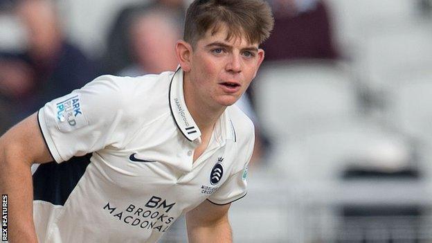 Ethan Bamber bowling for Middlesex