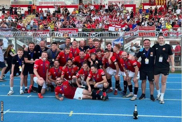 FC United of Manchester celebrate winning the Fenix Trophy