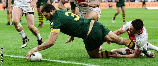 Greg Inglis scores a try against England