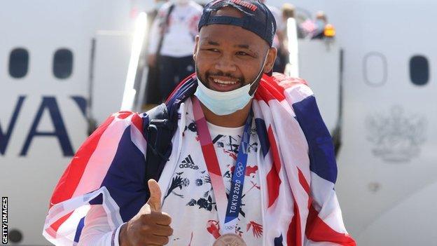 Boxer Frazer Clarke at Heathrow Airport