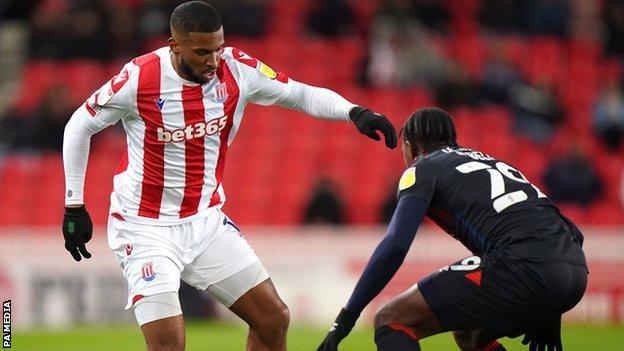 Stoke striker Tyrese Campbell and Luton's Amari'i Bell