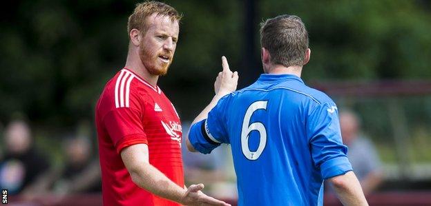 Adam Rooney and St Johnstone's Tam Scobbie