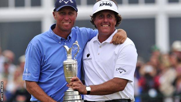 Mackay and Mickelson celebrate with the Claret Jug after winning the Open in 2013