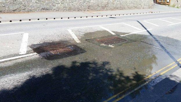 Overflowing manholes in Welshpool