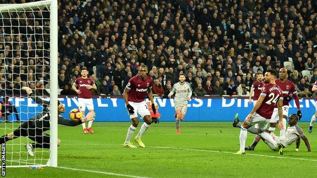 Sadio Mane (right) scores