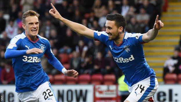 Dean Shiels races in to congratulate Nicky Clark on opening the scoring