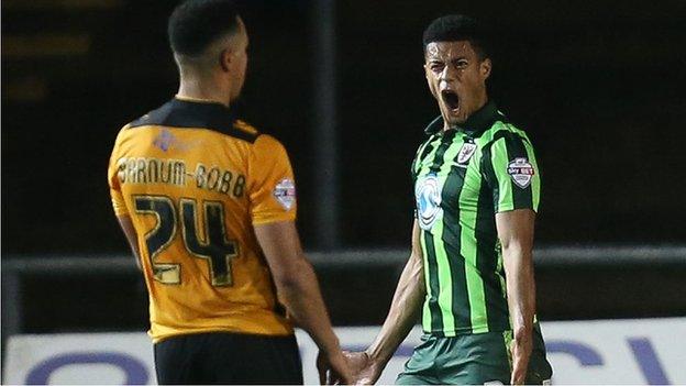 AFC Wimbledon's Lyle Taylor celebrates a goal