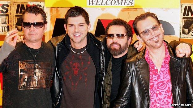 (L to R) Drummer Jon Farriss, new lead vocalist J.D. Fortune, keyboardist/guitarist Andrew Farriss and multi-instrumentalist Kirk Pengilly of INXS