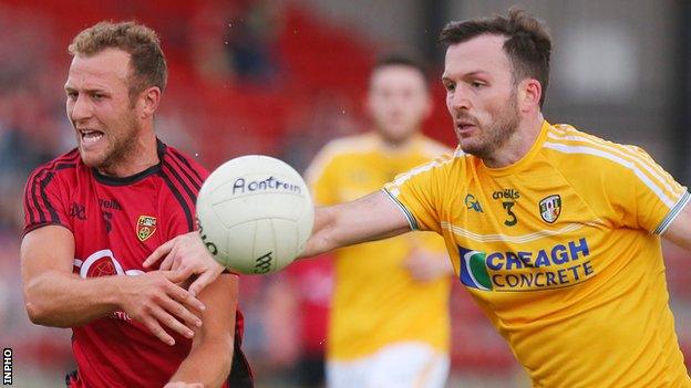 Down's Darren O'Hagan and Patrick Gallagher of Antrim in action at Pairc Esler