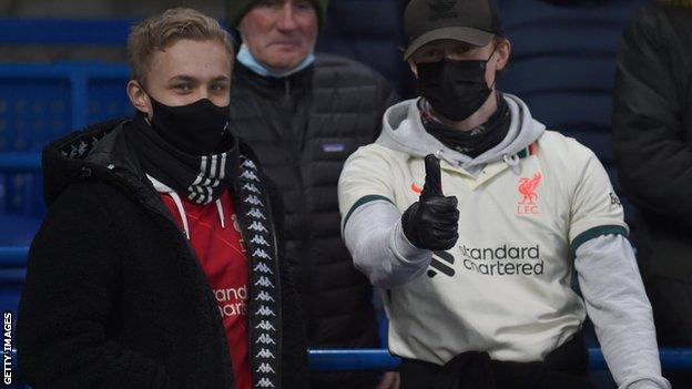 Liverpool fans standing at Stamford Bridge