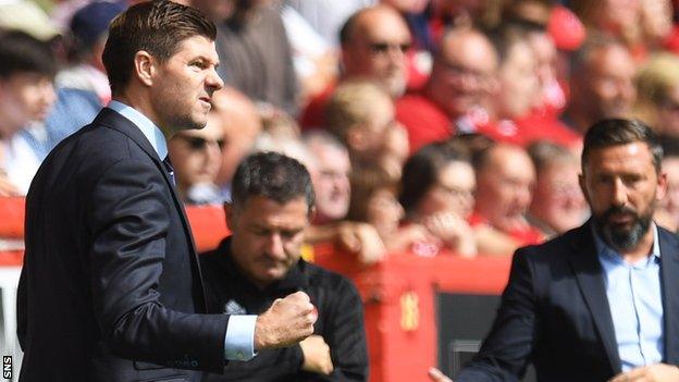 Steven Gerrard celebrates James Tavernier's penalty