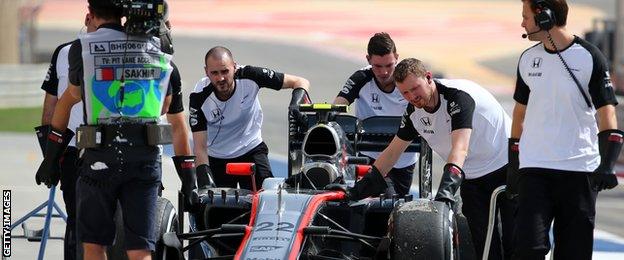 Ever since the start of the season - as seen here in Bahrain with mechanics pushing a car back to the garage- McLaren have suffered with engine issues