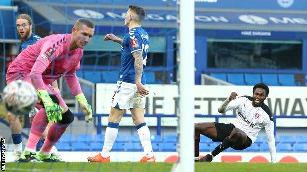 Matthew Olosunde celebrates after hooking a low shot across goal to equalise for Rotherham