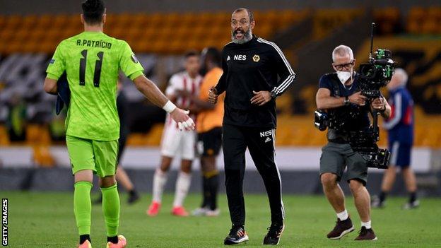 Wolves goalkeeper Rui Patricio is congratulated by his manager Nuno